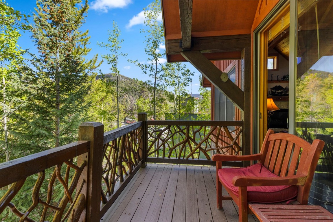 12 Big Boulder Court, Unit 13 Keystone, CO 80435 - Photo 23 of 35 a view of balcony with wooden floor and outdoor seating