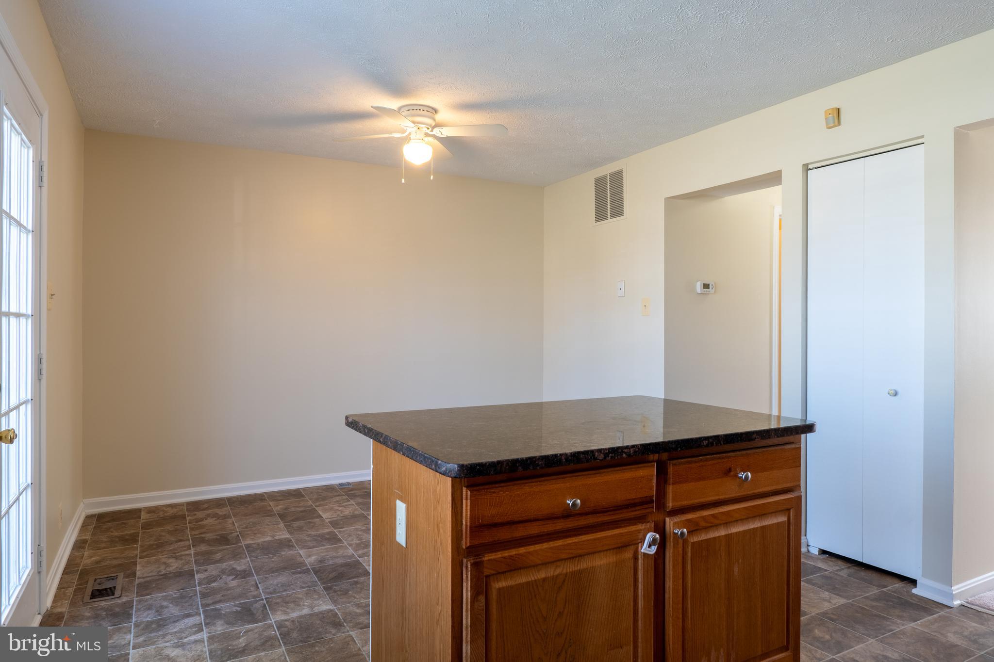 224 Oak Leaf Way Halethorpe, MD 21227 - Photo 11 of 32 a view of a hallway to rooms