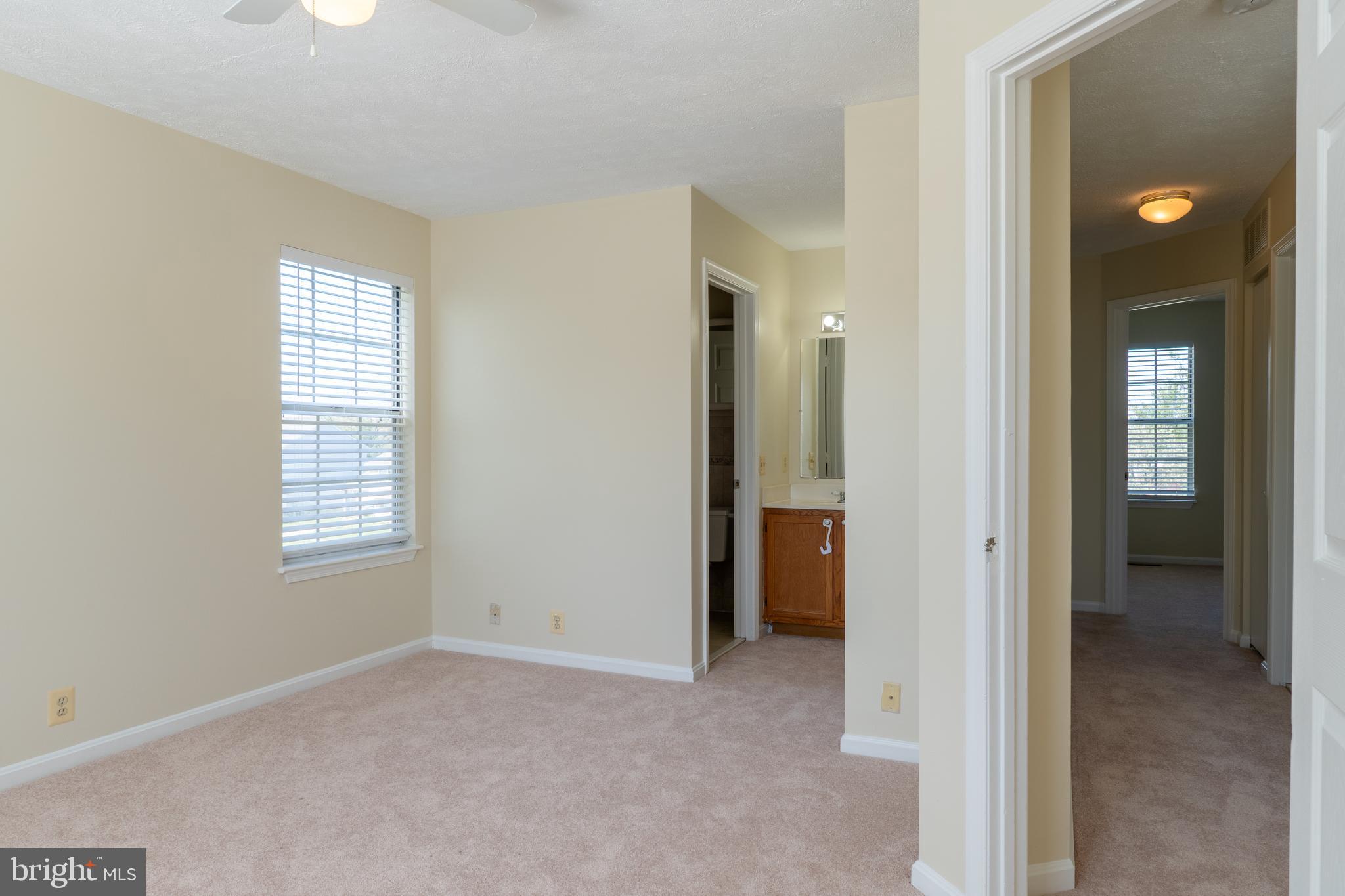 224 Oak Leaf Way Halethorpe, MD 21227 - Photo 15 of 32 a view of an empty room with window and bathroom