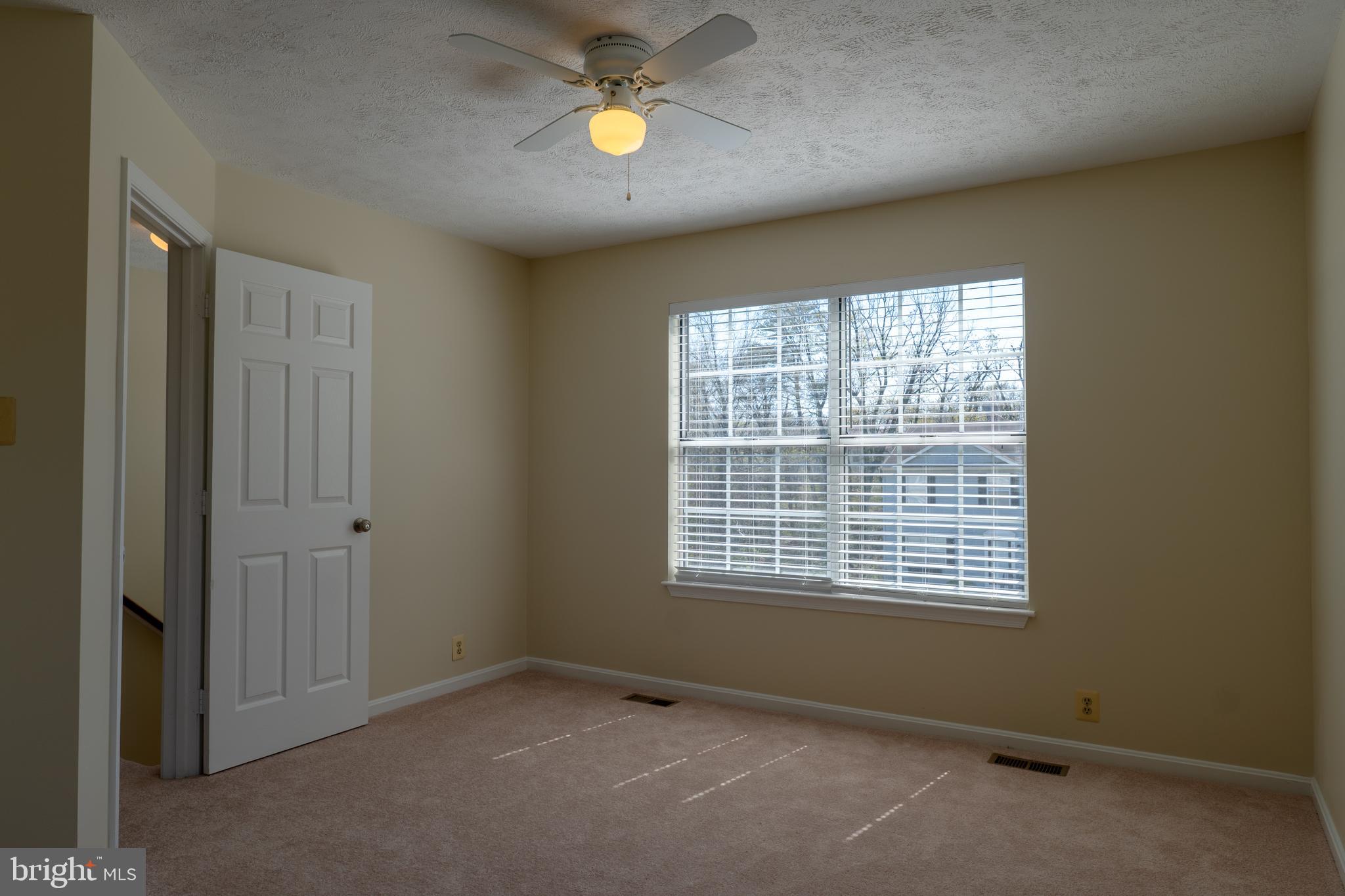 224 Oak Leaf Way Halethorpe, MD 21227 - Photo 18 of 32 a view of an empty room with a window
