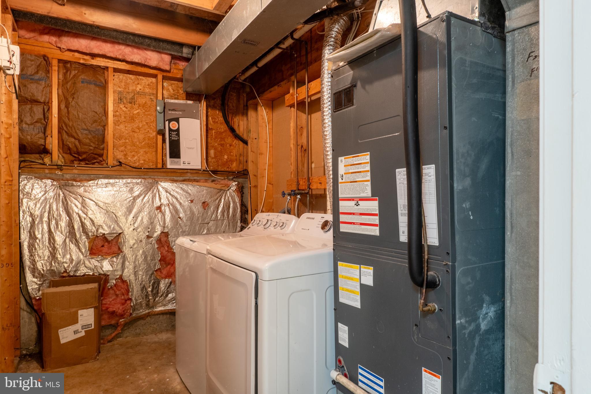 224 Oak Leaf Way Halethorpe, MD 21227 - Photo 30 of 32 a utility room with a washer and dryer