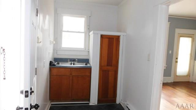 806 Raleigh Street Elizabeth City, NC 27909 - Photo 16 of 23 opposite end of the laundry area with sink and cab