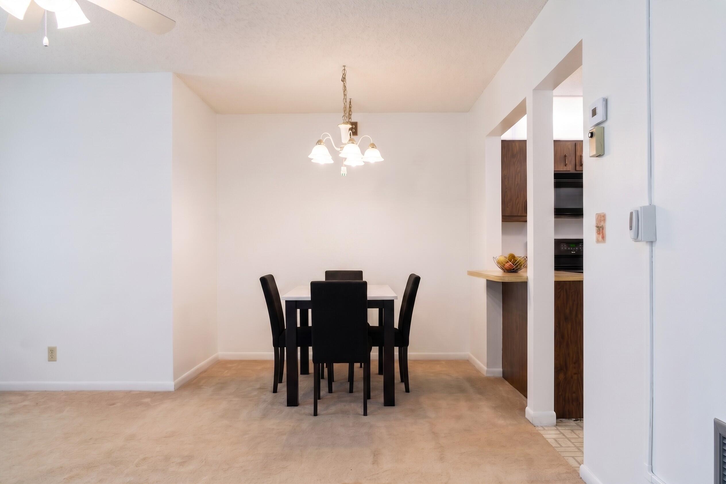 327 Pine Ridge Circle, Unit B2 Greenacres, FL 33463 - Photo 6 of 18 Dining Room Kitchen