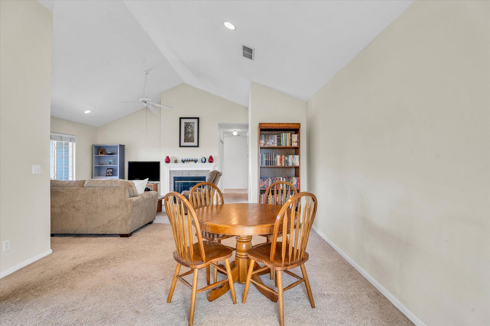 2402 Windward Boulevard, Unit 210 Champaign, IL 61821 - Photo 3 of 28 a living room with furniture and a couch