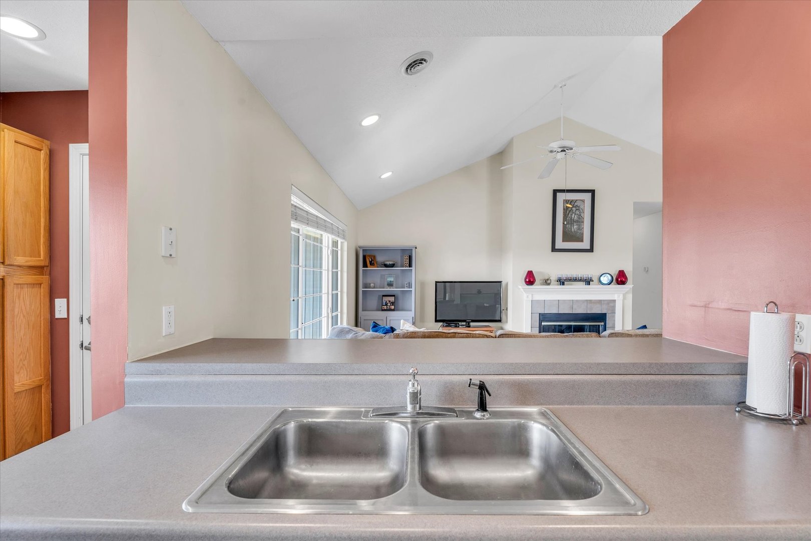 2402 Windward Boulevard, Unit 210 Champaign, IL 61821 - Photo 10 of 28 a kitchen with a sink and a stove top oven