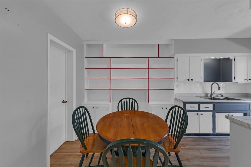 11 Southwest 4th Avenue, Unit 29 Boca Raton, FL 33432 - Photo 11 of 45 a view of a dining room with furniture and wooden floor