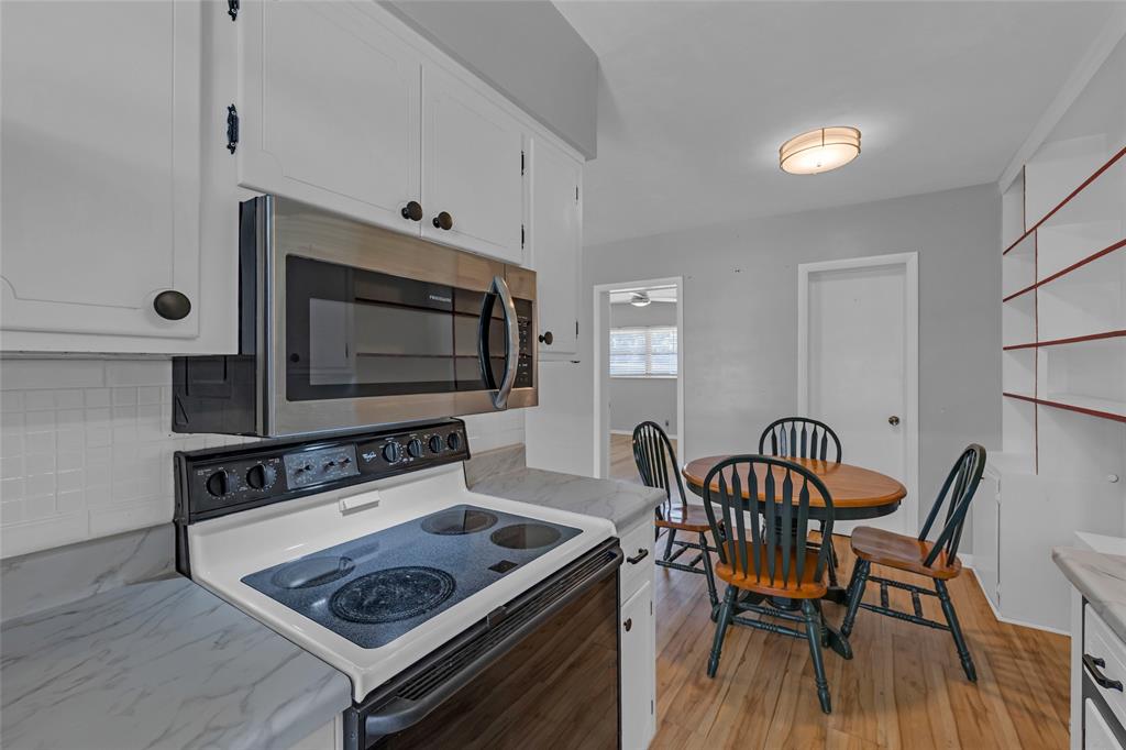 11 Southwest 4th Avenue, Unit 29 Boca Raton, FL 33432 - Photo 15 of 45 a living room with furniture and a flat screen tv
