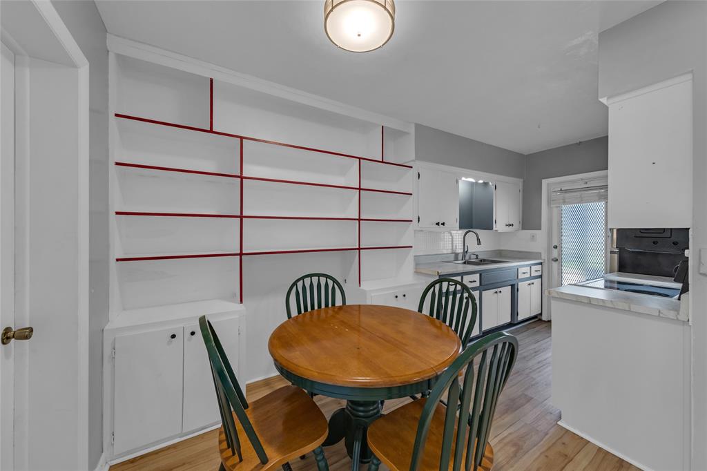 11 Southwest 4th Avenue, Unit 29 Boca Raton, FL 33432 - Photo 20 of 45 a view of a dining room with furniture and wooden floor