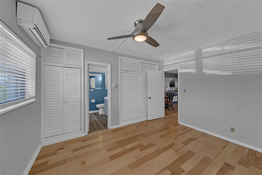 11 Southwest 4th Avenue, Unit 29 Boca Raton, FL 33432 - Photo 26 of 45 a view of empty room with wooden floor