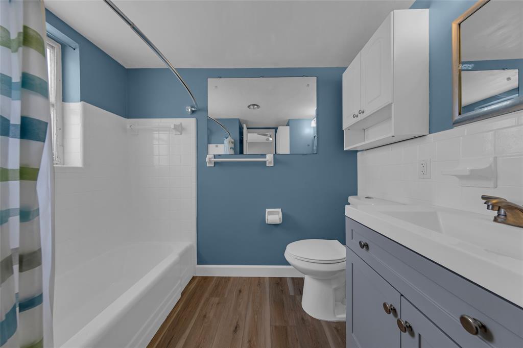 11 Southwest 4th Avenue, Unit 29 Boca Raton, FL 33432 - Photo 28 of 45 a bathroom with a toilet and a shower