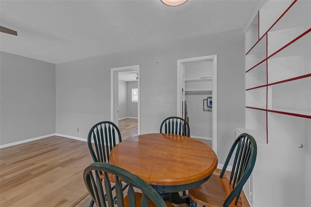 11 Southwest 4th Avenue, Unit 29 Boca Raton, FL 33432 - Photo 9 of 45 a view of a dining room with furniture and wooden floor