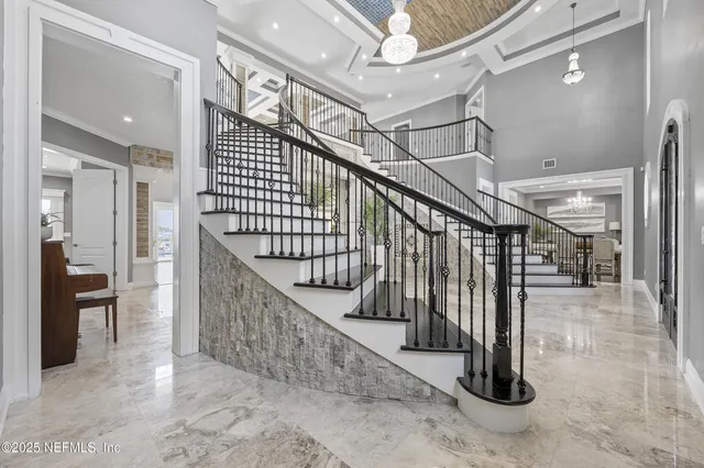 a view of a patio with a table and chairs