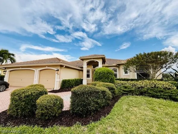 front view of a house with a yard