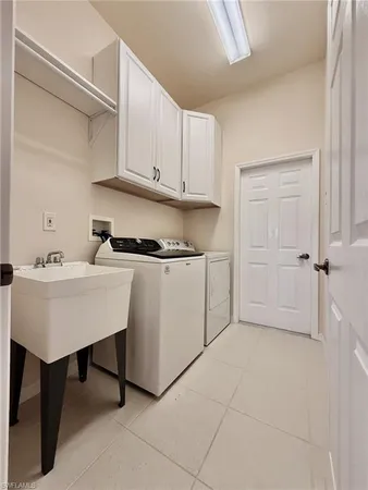 a view of a living room and kitchen floor