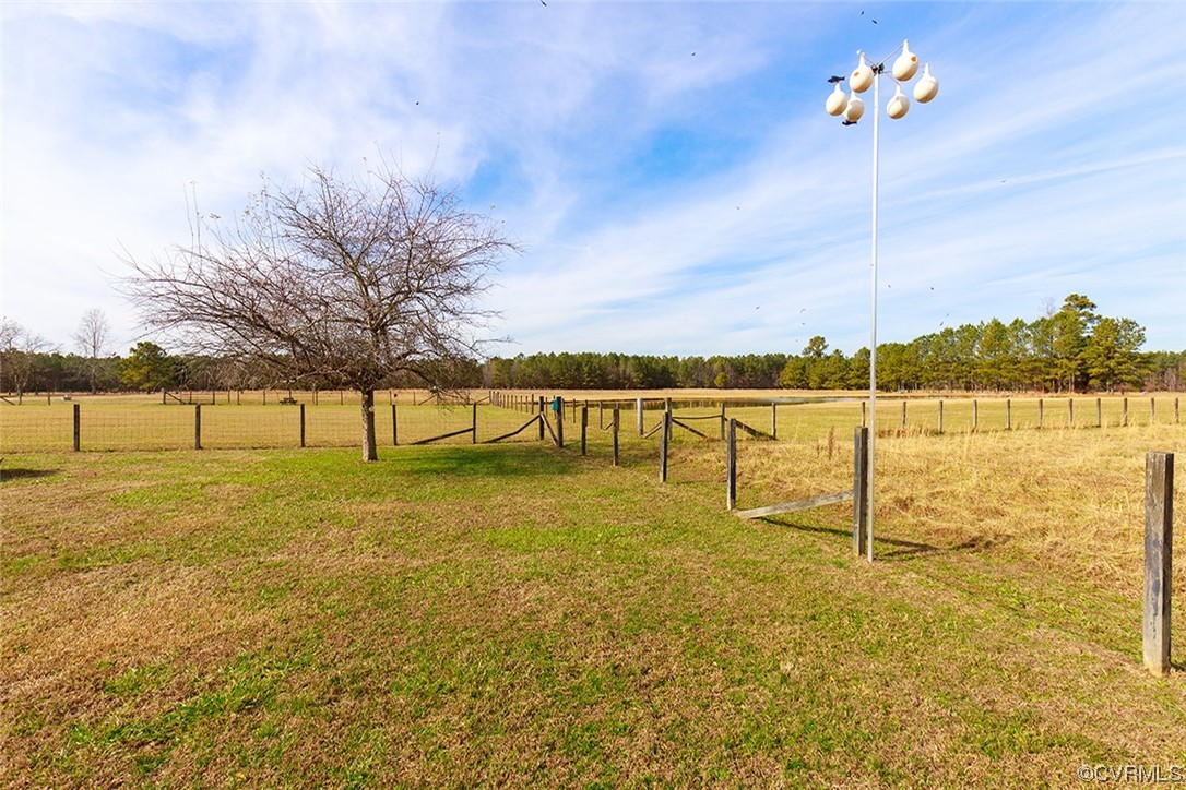 619 Spring Grove Road Spring Grove, VA 23881 - Photo 16 of 45 a view of swimming pool with a yard