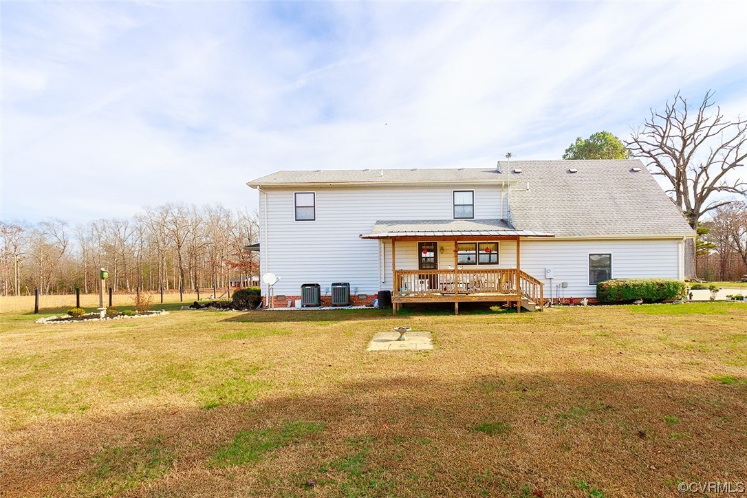 619 Spring Grove Road Spring Grove, VA 23881 - Photo 19 of 45 a view of a house with a yard and sitting area