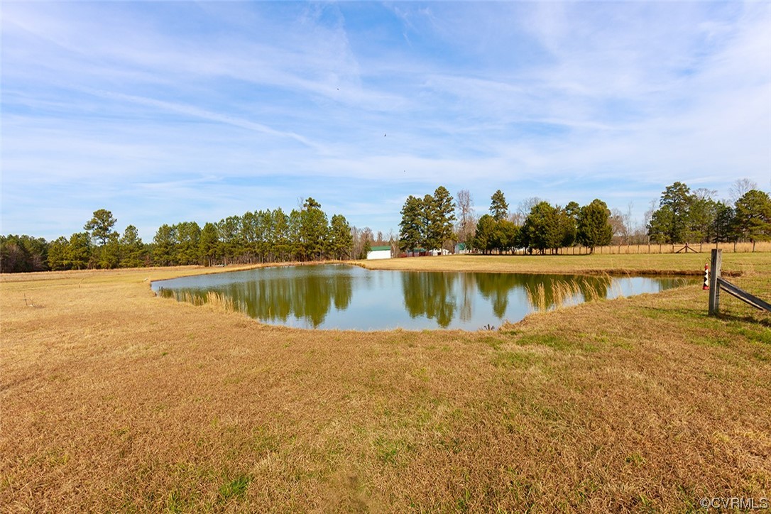 619 Spring Grove Road Spring Grove, VA 23881 - Photo 23 of 45 a view of a lake with houses in the back