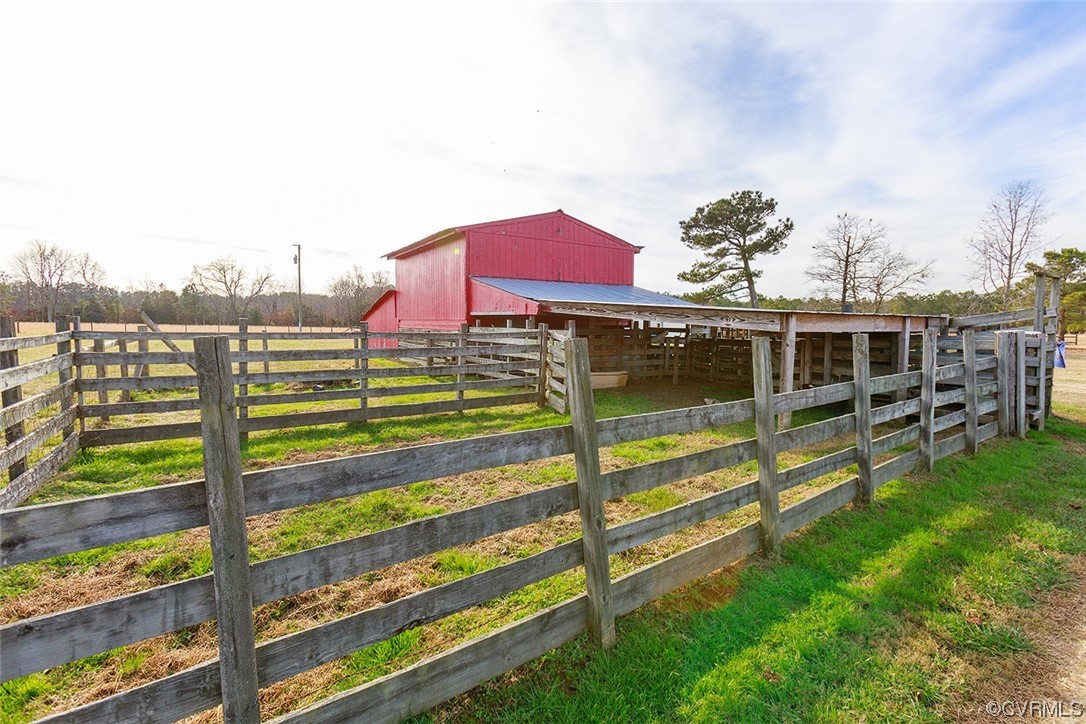 619 Spring Grove Road Spring Grove, VA 23881 - Photo 27 of 45 a view of a house with a yard