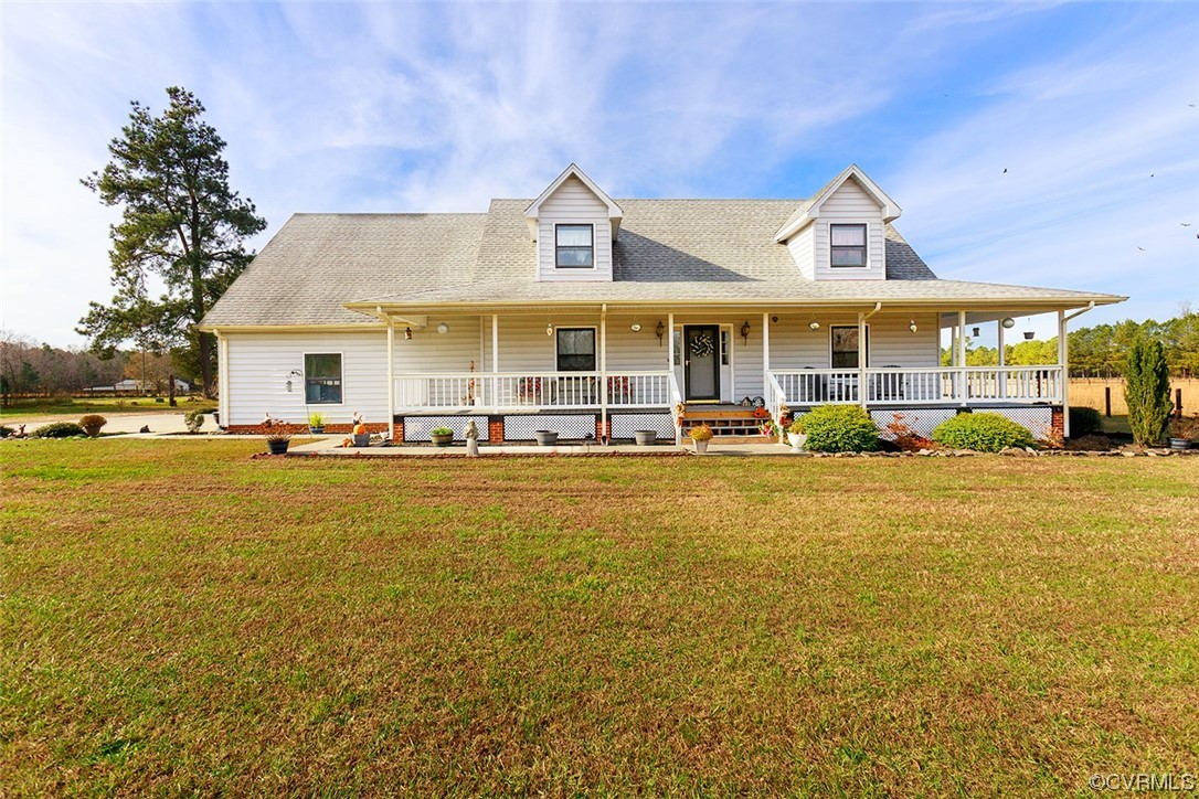 619 Spring Grove Road Spring Grove, VA 23881 - Photo 3 of 45 a front view of a building with swimming pool