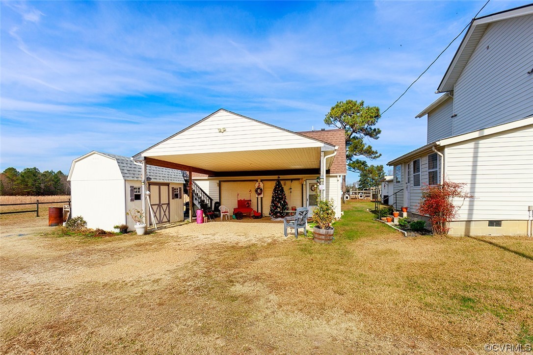 619 Spring Grove Road Spring Grove, VA 23881 - Photo 33 of 45 a view of a building with sitting area and roof