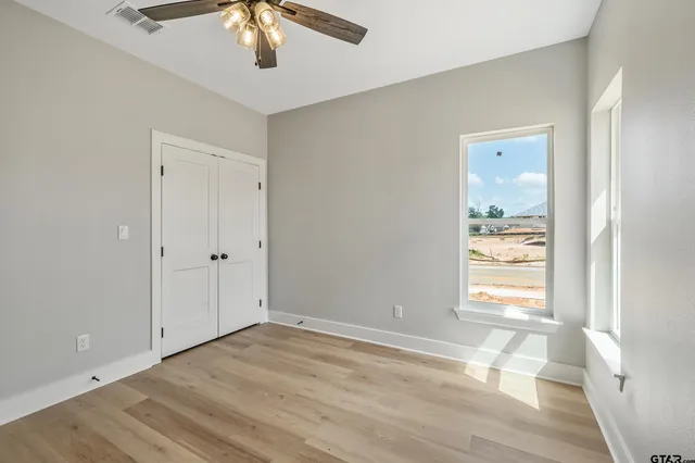a view of an empty room and window