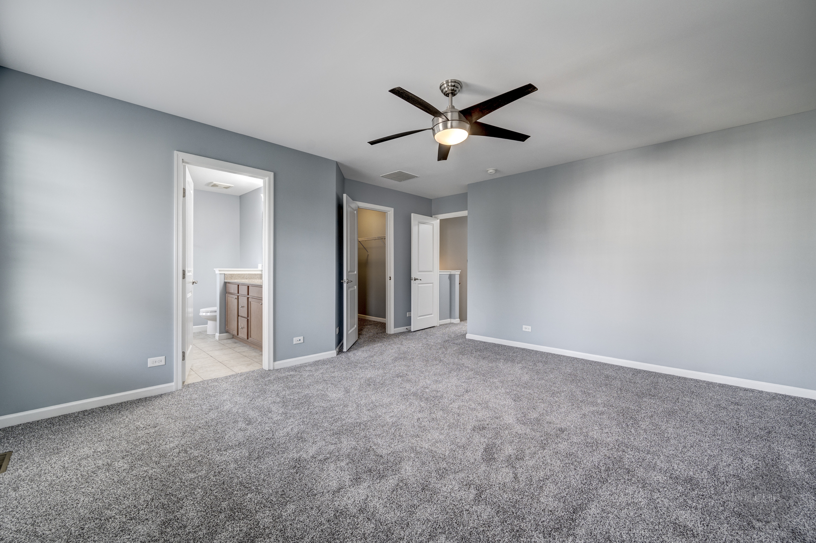 331 North Commerce Street Aurora, IL 60504 - Photo 29 of 41 a view of an empty room with a ceiling fan
