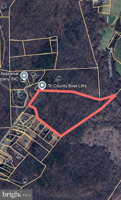 Bushwood City Road Chaptico, MD 20621 - Photo 2 of 4 a room with water heater