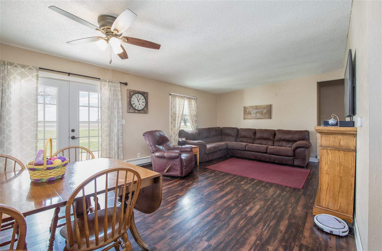 6775 South Sarah Avenue Rochelle, IL 61068 - Photo 12 of 26 a living room with furniture fireplace and a window
