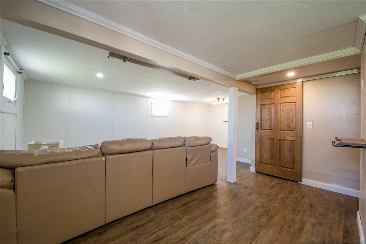 6775 South Sarah Avenue Rochelle, IL 61068 - Photo 24 of 26 a room with furniture and wooden floor