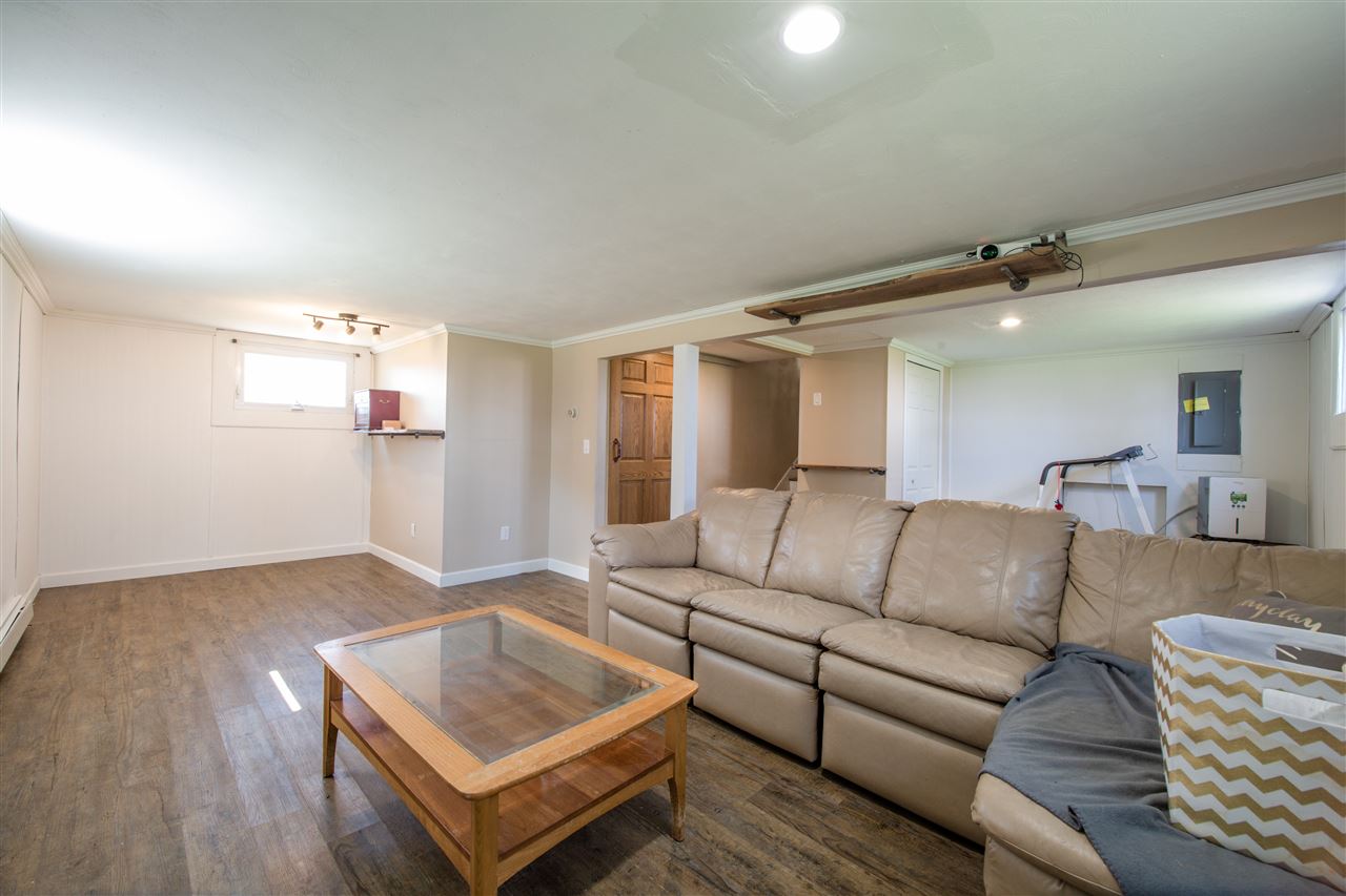 6775 South Sarah Avenue Rochelle, IL 61068 - Photo 26 of 26 a living room with furniture and a wooden floor