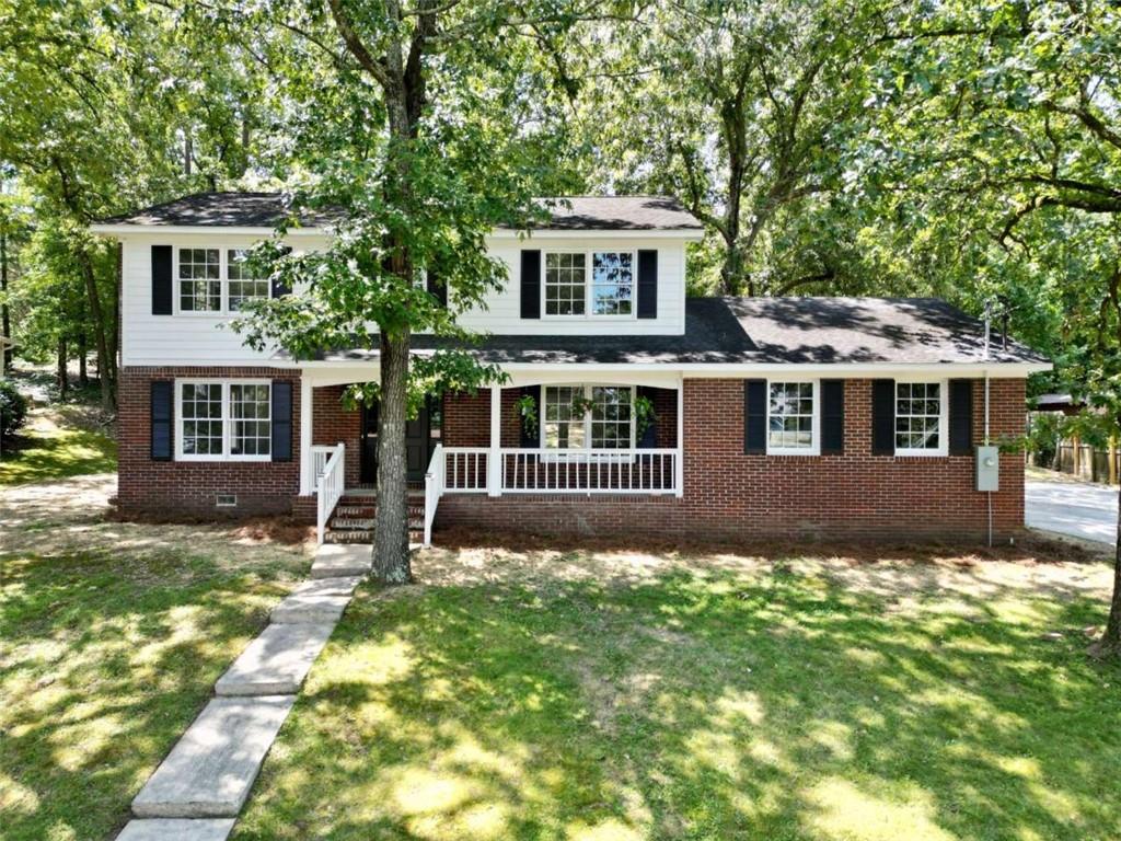 a house view with a garden space