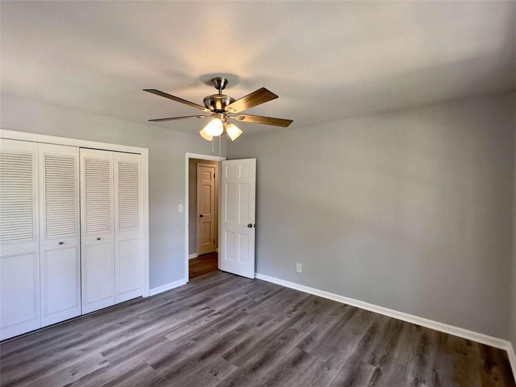 6 Westlyn Drive Rome, GA 30165 - Photo 21 of 25 wooden floor in an empty room with a window