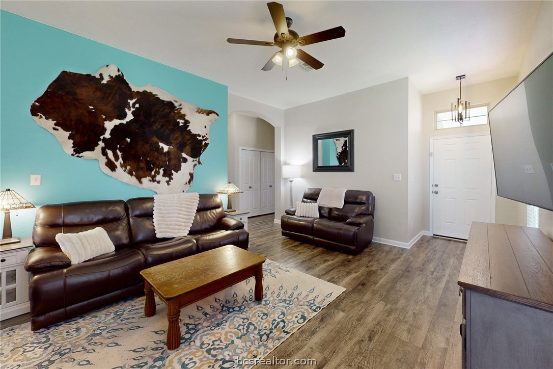 2071 Positano Loop Bryan, TX 77808 - Photo 8 of 31 a living room with furniture and a rug