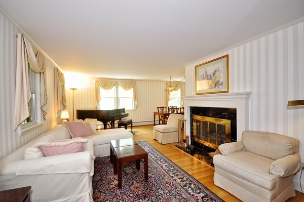 24 Prospect Hill Road Lexington, MA 02421 - Photo 3 of 22 a living room with furniture and a fireplace