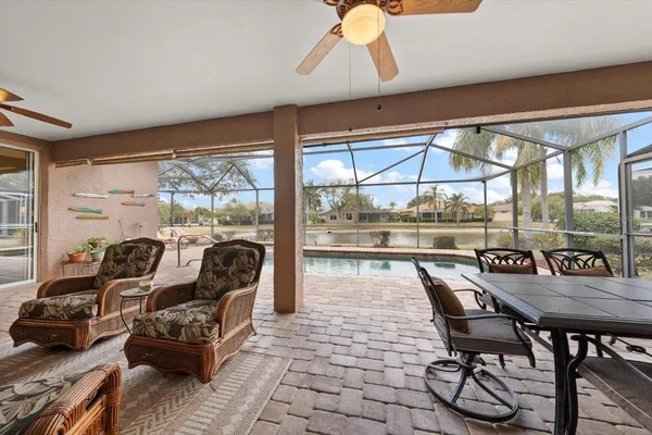 a bed room with a bed and a chair