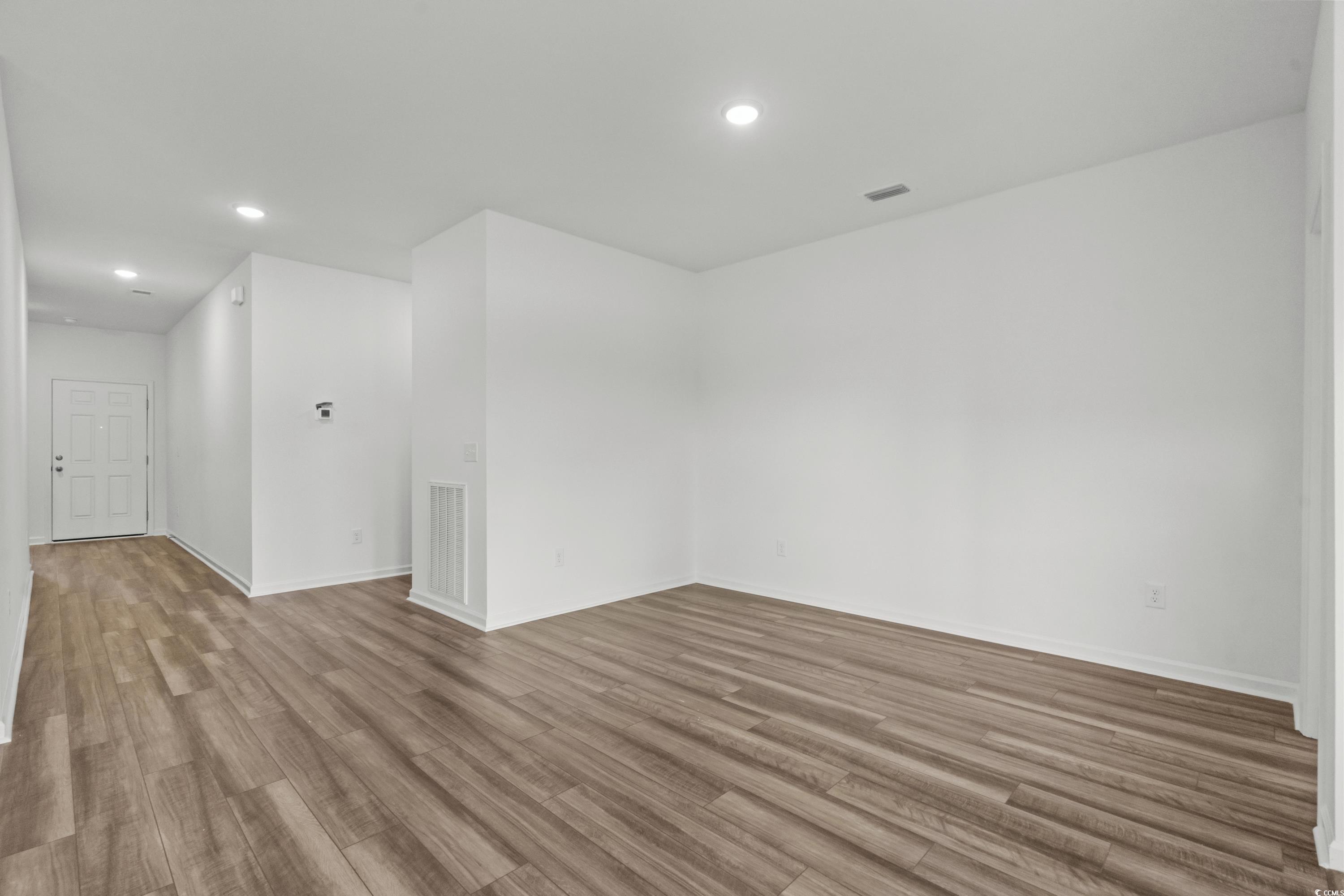 435 Castillo Drive Longs, SC 29568 - Photo 9 of 27 Unfurnished room with recessed lighting and wood finished floors