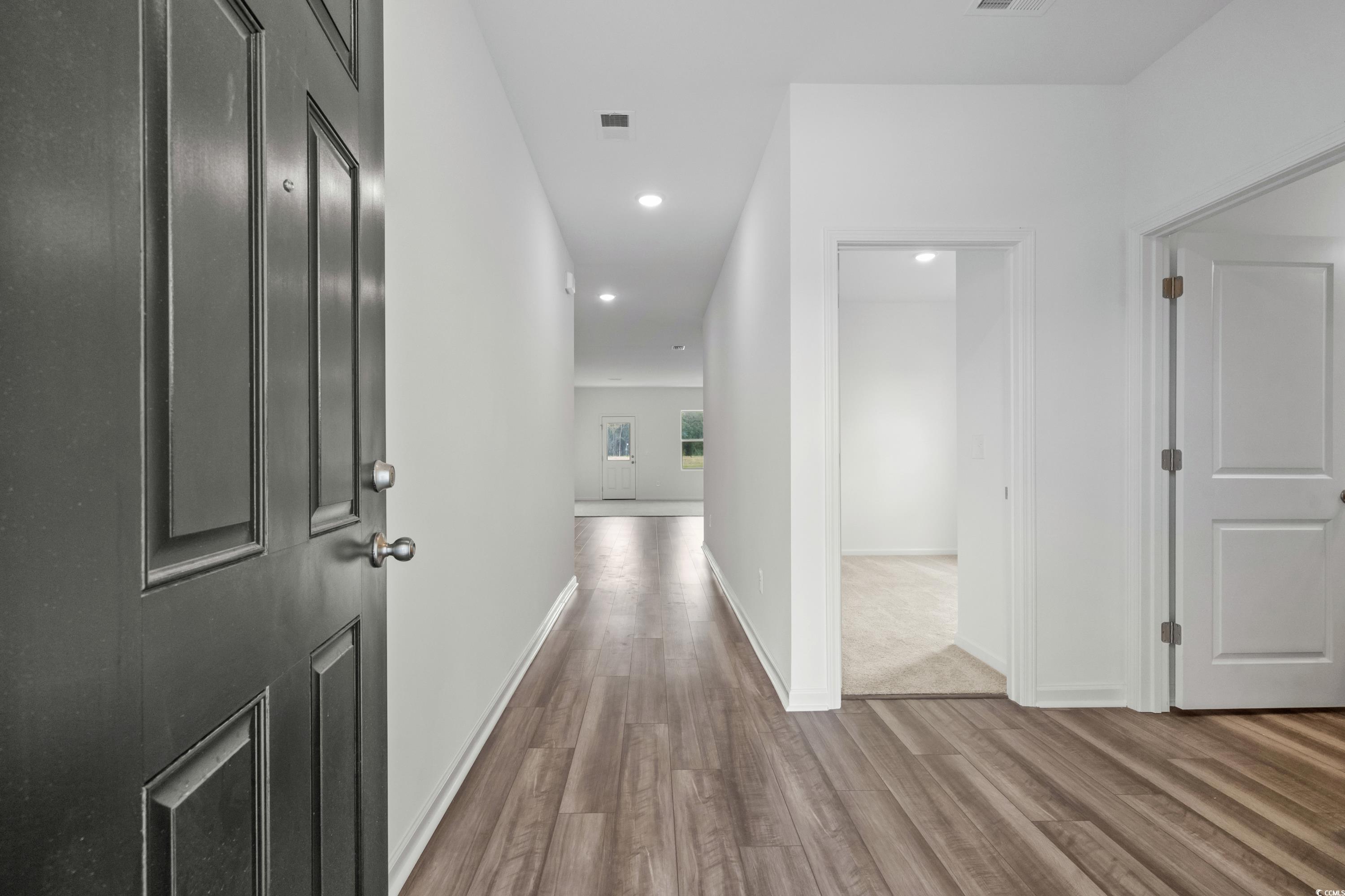 435 Castillo Drive Longs, SC 29568 - Photo 4 of 27 Hall with recessed lighting and light wood-type flooring
