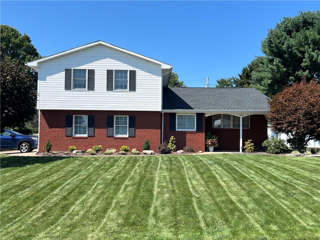 200 Courtland Road Indiana, PA 15701 - Photo 1 of 42 a front view of a house with a yard