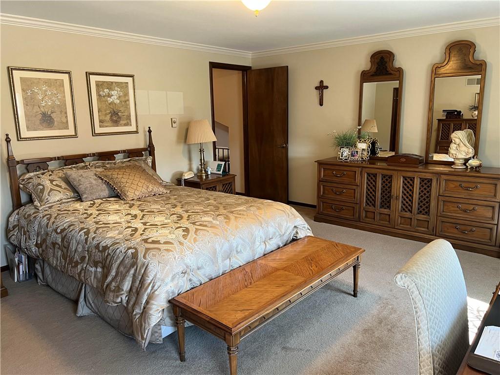 200 Courtland Road Indiana, PA 15701 - Photo 19 of 42 a bedroom with a bed and wooden floor