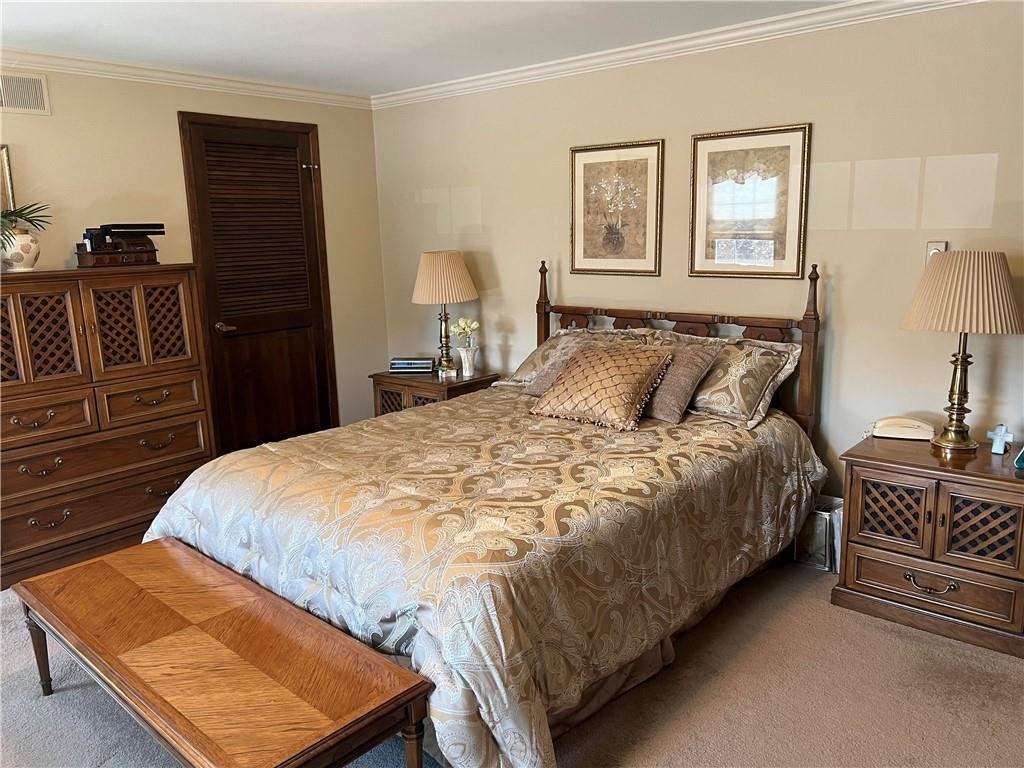 200 Courtland Road Indiana, PA 15701 - Photo 20 of 42 a bedroom with a bed and wooden floor