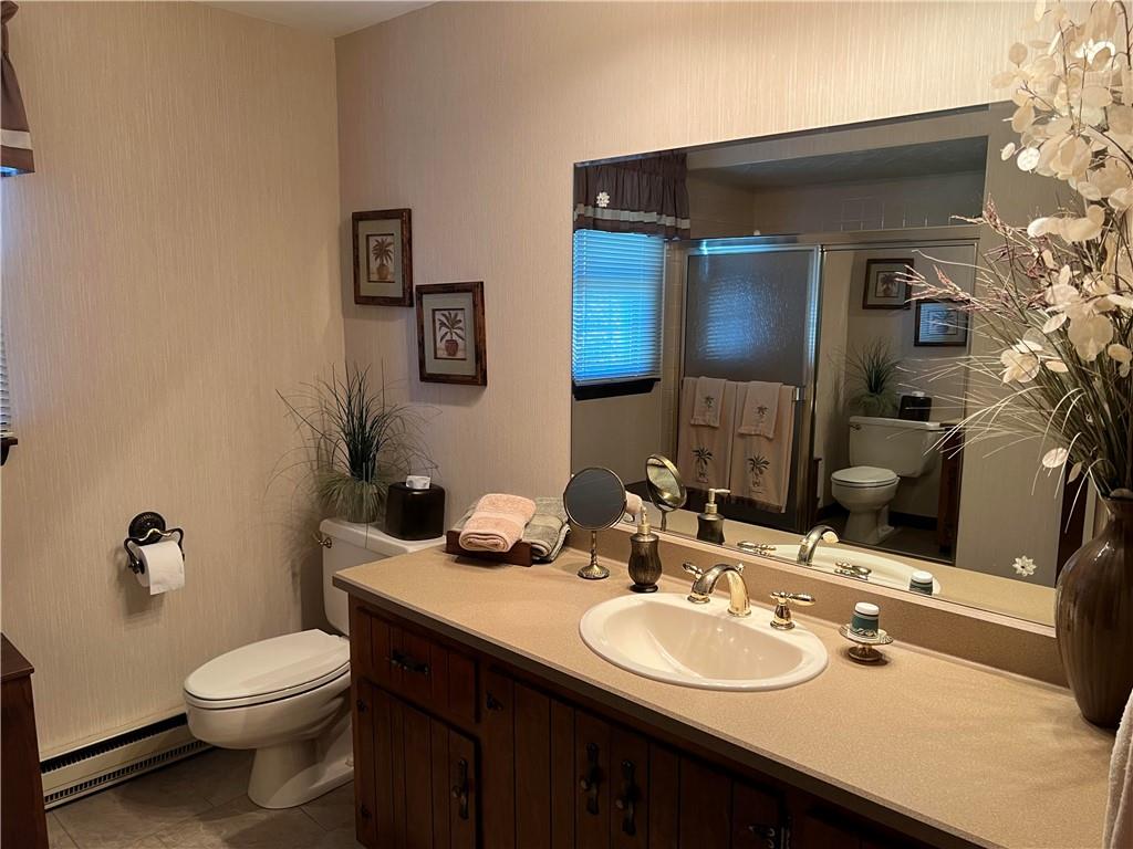 200 Courtland Road Indiana, PA 15701 - Photo 27 of 42 a bathroom with a sink vanity mirror and toilet