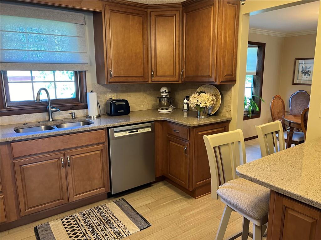 200 Courtland Road Indiana, PA 15701 - Photo 3 of 42 a kitchen with stainless steel appliances granite countertop a sink stove and cabinets