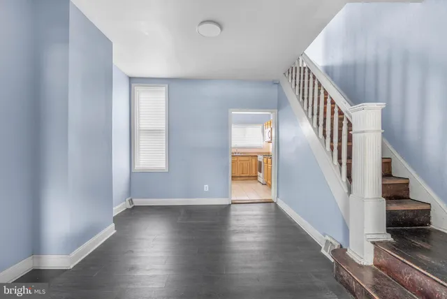 a view of entryway with wooden floor