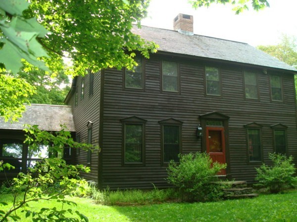 1379 W Road Ashfield, MA 01330 - Photo 3 of 30 a front view of a house with garden