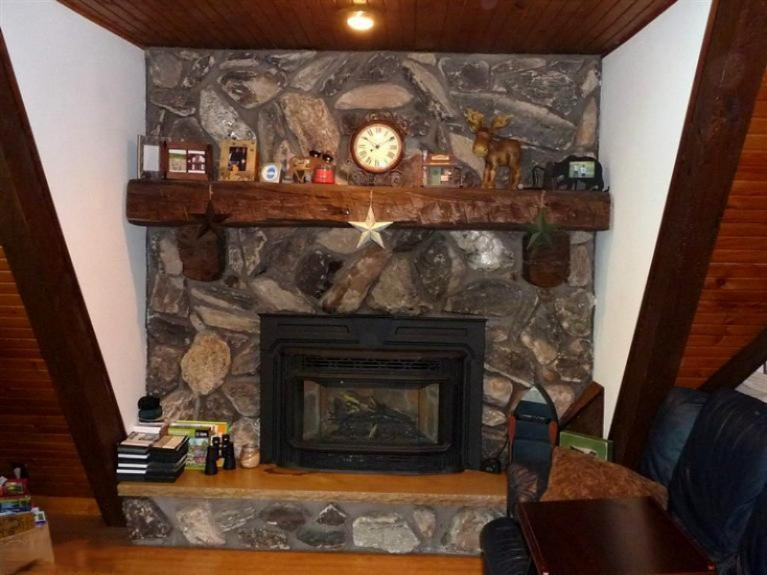 11470 Alpine Road Canadian Lakes, MI 49346 - Photo 8 of 23 Dramatic Fireplace