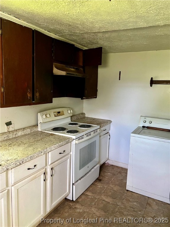 4832 Lisbon Road Clarkton, NC 28433 - Photo 6 of 8 a kitchen with a sink and a stove top oven