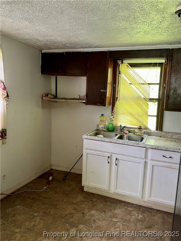 4832 Lisbon Road Clarkton, NC 28433 - Photo 7 of 8 a bathroom with a sink and a mirror
