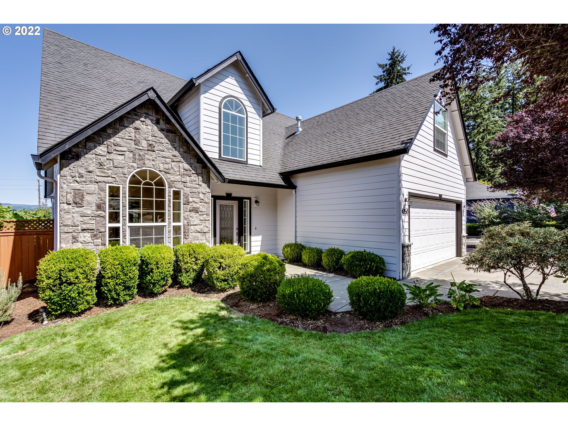 4750 Rocky Road Springfield, OR 97478 - Photo 1 of 32 a front view of a house with a garden