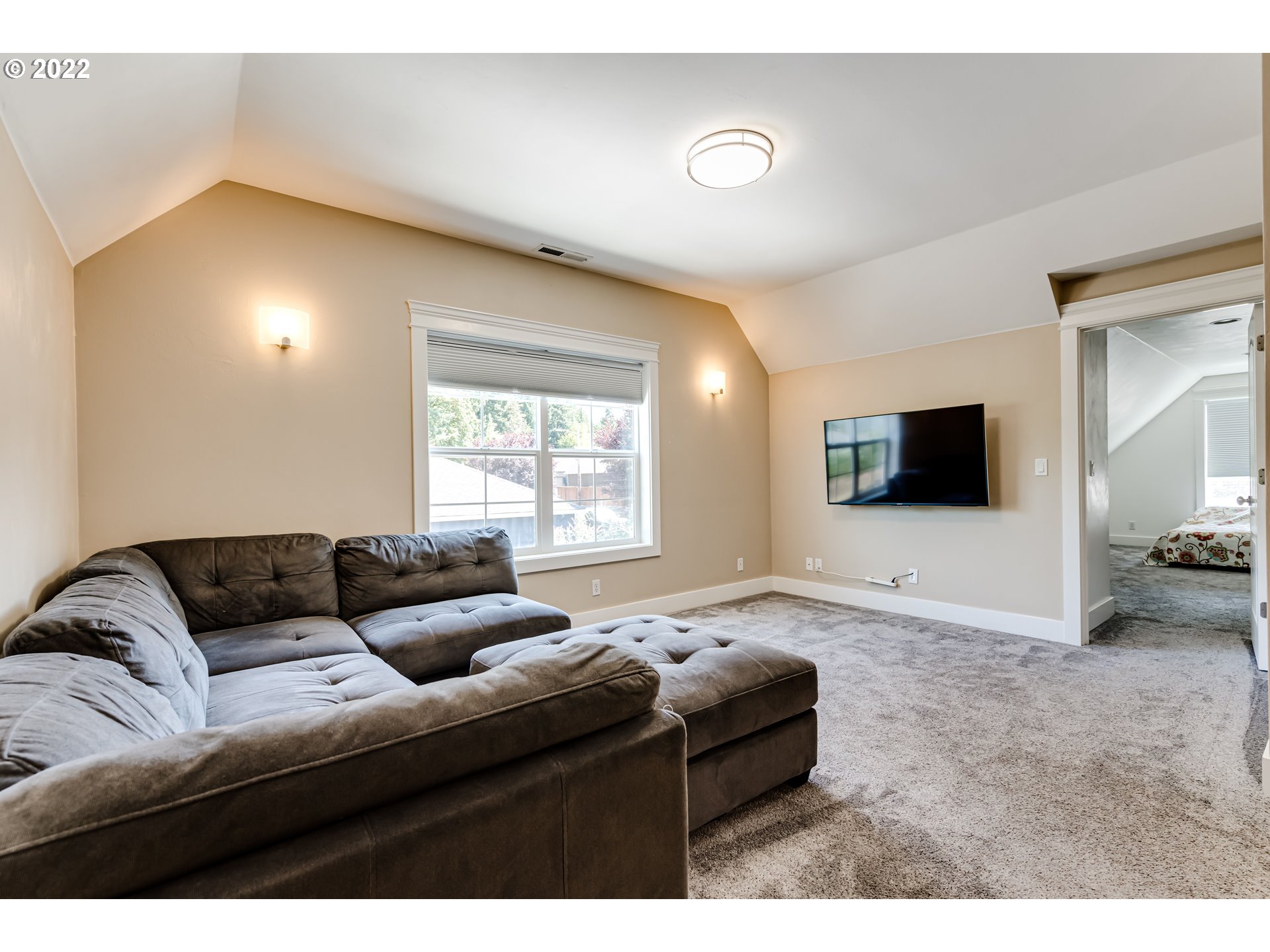 4750 Rocky Road Springfield, OR 97478 - Photo 21 of 32 a living room with furniture and a flat screen tv
