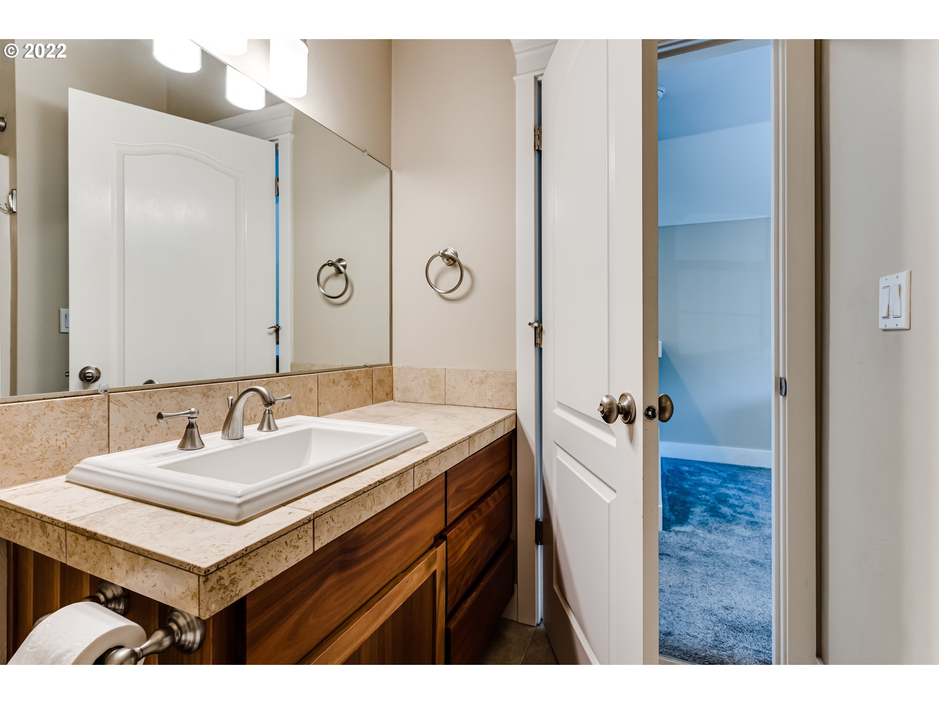 4750 Rocky Road Springfield, OR 97478 - Photo 26 of 32 a bathroom with a sink and a mirror